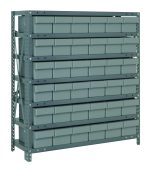 The Quantum Shelving Unit measures 12D x 36L x 39H and includes seven heavy-duty shelves with a load capacity of 400 lbs each. It comes with 36 clear black bins (11-5/8L x 5-9/16W x 4-5/8H) and features galvanized steel uprights and cross bars for robust support and organization.