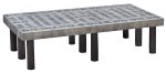 The Quantum Polymer Dunnage Rack is a rectangular, vented rack with a perforated design and grid pattern, supported by sturdy black cylindrical legs. It boasts a 700 lb. load capacity and is made from durable polyethylene in the USA.