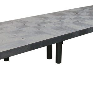 A modern gray Quantum Polymer Dunnage Rack with a textured polyethylene surface and sturdy black legs, made in the USA, supports up to 2700 lbs. Ideal for large meetings or dining spaces.