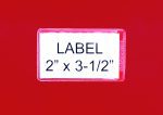 A close-up of a white label against a red background showcases the Quantum Adhesive Label Holder with clear black text, measuring 3-1/2 x 2. Ideal for inserts, this design comes in a convenient pack of 24.