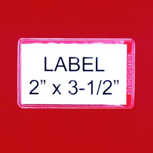 A close-up of a white label against a red background showcases the Quantum Adhesive Label Holder with clear black text, measuring 3-1/2 x 2. Ideal for inserts, this design comes in a convenient pack of 24.