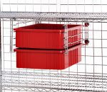 Two red plastic bins hang on a metal wire shelving unit using the Quantum Double Bin Drawer Slide, showcasing a chrome-plated finish. The silver wire grids highlight the sleek design of this functional storage solution against a plain white background.