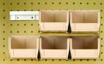 The complete package features six 5-3/8L x 4-1/8W x 3H ivory Quantum QUS210 bins and two bin rails on a perforated pegboard, forming a tidy two-by-three grid with one space open on the top right.