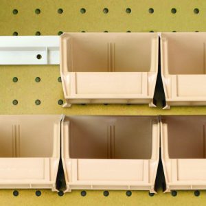 The complete package features six 5-3/8L x 4-1/8W x 3H ivory Quantum QUS210 bins and two bin rails on a perforated pegboard, forming a tidy two-by-three grid with one space open on the top right.