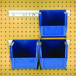 Four Quantum Hang-N-Stack blue bins and two bin rails are mounted on a light brown pegboard, creating an efficient setup with three bins organized on a white rail. This complete package offers tidy organization with multiple bins ideal for optimal use.