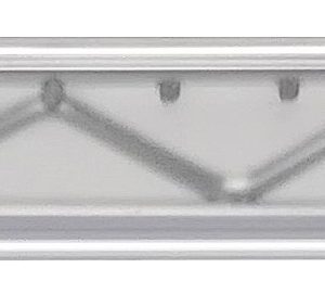 The Quantum Label Holder, 24, Clear, rests across a metallic truss structure, its smooth edge and precise markings beautifully revealing the intricate triangular patterns underneath.