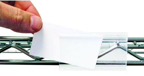 LHI-3_LHI-6.jpg A hand inserts a Quantum Label Insert, 3W x 1-1/4D, into a clear holder on a metal wire shelf. The sturdy framework of the shelf in the background highlights its organizational ease.