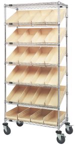 The Quantum Bin Systems Unit, measuring 36L x 18W x 80H, includes four posts and offers two flat wire shelves alongside five slanted ones. It comes with twenty-four ivory bins (17-7/8L x 8-3/8W x 4H) and four swivel casters (two with brakes), making it ideal for organizing items in dry storage.
