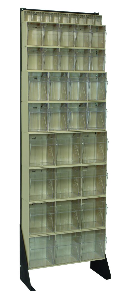 The Quantum Tip Out Bin Floor Stand is a single-sided storage rack measuring 10D x 23-5/8W x 75H, made from a sturdy metal frame with a black coated finish. It includes (4) QTB303, (2) QTB304, (2) QTB305, and (1) QTB306 ivory bins in a tiered pattern.