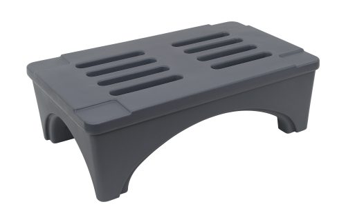 The Quantum Dunnage Rack is a small, gray, polymer step stool with a ventilated top for grip. It has a sturdy design, measuring 36W X 22D X 12H, featuring four short legs and a curved arch on the sides for added stability. Capacity: 2000 lbs; NSF certified.