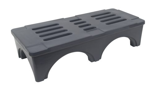 The Quantum Dunnage Rack, a gray polymer bench measuring 48W x 22D x 12H, features a ventilated top with slotted grooves for drainage. It has three arch-shaped leg supports for stability and is NSF-certified with a capacity of up to 2000 lbs., ensuring durability and reliability.