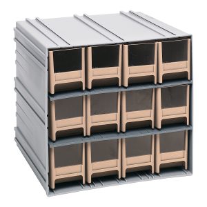 The Quantum Interlocking Storage Cabinets measure 11-3/8D x 11-3/4W x 11H with gray exteriors and feature ivory drawers with windows for visibility. These versatile cabinets interlock horizontally and vertically or can be wall-mounted, ideal for organizing small items. Made in the USA.