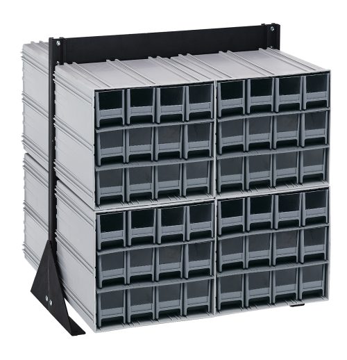 A double-sided Quantum Interlocking Storage Cabinets Floor Stand measures 24D x 23-5/8W x 28H and supports up to 750 lbs. It features a black-coated, metal frame with angled side supports, housing (96) small gray drawers with darker handles and contains (8) QIC-122 units.