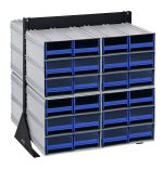 The Quantum Interlocking Storage Cabinets Floor Stand is a double-sided rack with a 750 lbs. load capacity, measuring 24D x 23-5/8W x 28H. It includes (48) blue drawers supported by a black-coated finish and contains (8) Qic-64 units to efficiently organize tools or small parts.