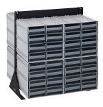 The Quantum Interlocking Storage Cabinets Floor Stand is a double-sided organizer with 64 gray drawers in a black-coated 14-gauge steel frame, measuring 24D x 23-5/8W x 28H. With its stackable design and high load capacity, it efficiently organizes small items in four columns and three rows.