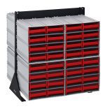 The Quantum Interlocking Storage Cabinet Floor Stand measures 24D x 23-5/8W x 28H and includes (64) red drawers in a double-sided grid, ideal for organizing screws or craft supplies. It features (8) QIC-83 components and a sturdy black 14-gauge steel frame with a 750 lbs load capacity.