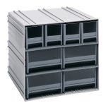 The Quantum Interlocking Storage Cabinets feature gray drawers made in the USA, measuring 11-3/8D x 11-3/4W x 11H. Each includes two dividers and can interlock horizontally or vertically. They have windows and a ridged surface, perfect for seamless organization alongside windows.