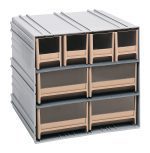 The Quantum Interlocking Storage Cabinets, measuring 11-3/8D x 11-3/4W x 11H, are gray with ivory drawers. They interlock horizontally and vertically or can be wall-mounted. Each cabinet has four bins on top and two larger ones below with clear fronts, plus four IDR202 and four IDR204 windows and two dividers per drawer. Made in the USA.