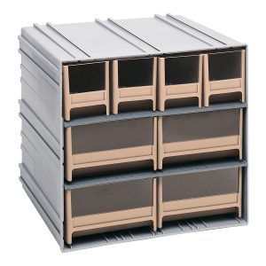 The Quantum Interlocking Storage Cabinets, measuring 11-3/8D x 11-3/4W x 11H, are gray with ivory drawers. They interlock horizontally and vertically or can be wall-mounted. Each cabinet has four bins on top and two larger ones below with clear fronts, plus four IDR202 and four IDR204 windows and two dividers per drawer. Made in the USA.