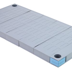 The Quantum Millenia Shelf is a 24W x 18D rectangular platform with a textured gray finish, blue side accents, and four black circular pads at each corner. Its made entirely from polymer materials and includes a removable solid shelf mat.