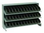 The Quantum Pick Rack is a compact, gray metal storage solution with a bench-style design featuring three sloped shelves and 36 QSB100 black bins for organizing files. It measures 12-1/2L x 36W x 23H and has a sturdy capacity of 250 lbs, making document access easy.