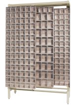The Free Standing Slider is a large beige storage cabinet, 18D x 48W x 77H, made of tough 14-gauge steel with a 2000 lbs load capacity. It includes (9) QTB305 and (43) QTB306 tip-out ivory bins for efficient organization and accessibility.
