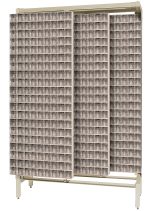The Free Standing Slider is an 18D x 48W x 77H storage rack made of tough 14-gauge steel with a sliding design. It has a load capacity of 2000 lbs, includes (80) QTB309 tip-out ivory bins for organized access, and stands securely on a metal frame.