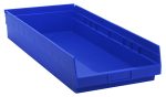 A blue polypropylene Economy Shelf Bin, 23-5/8W x 11-1/8D x 4H, with a molded-in label holder and rear hanglock, includes seven divider slots. The empty bin rests on a white background. Made in the USA.