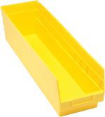 The Quantum Economy Shelf Bin is a yellow polypropylene storage bin, measuring 23-5/8W x 6-5/8D x 6H, featuring an open top, sloped front, handle, rear hanglock for nesting, seven divider slots for organizing tools or small items, and a molded-in label holder. Made in the USA.