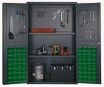 The Quantum Heavy-Duty 48 Bin Cabinet features pegboard doors displaying hand tools like wrenches, pliers, and a saw. With 14-gauge all-welded construction, it holds a drill and sander on adjustable shelves. It includes punched panels and 64 QUS210 green bins, with a toolbox on the bottom shelf.
