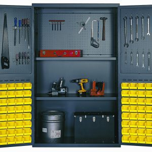 The Quantum Heavy-Duty 48 Bin Cabinet features punched panels on the inside rear wall and doors, with two adjustable shelves each having a 400 lb. capacity. It holds a red toolbox, power tools, a metal container, and a black box, while (64) QUS210 yellow bins line the doors.