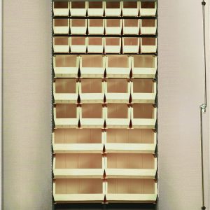 The Quantum Heavy-Duty 36 Bin Cabinet features a beige powder-coated finish and 14-gauge all-welded construction. It includes (18) QUS230, (12) QUS240, and (6) QUS250 ivory bins in a grid pattern. This open metal cabinet has two tall doors with a secure side locking mechanism.