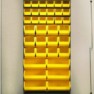 The Quantum Heavy-Duty 36 Bin Cabinet, with all welded construction and a beige powder-coated finish, features a grid of yellow bins including (18) QUS230, (12) QUS240, and (6) QUS250 bins for organized storage when the doors open.