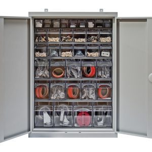 The Quantum Tip Out Bin Cabinet, measuring 26-1/4W x 10D x 36-1/2H, features flush doors revealing organized compartments with the QTB304, QTB305, and QTB306 models. The QTB309 gray tip-out bins hold screws, plastic fittings, and red tape rolls efficiently.