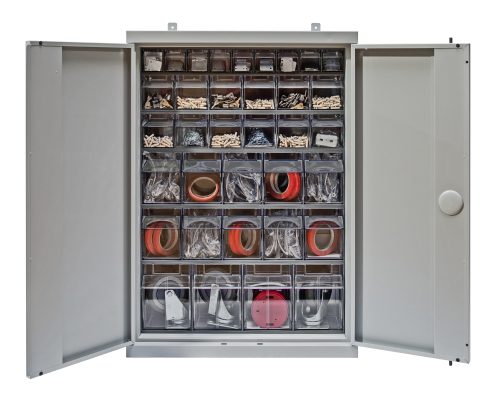 The Quantum Tip Out Bin Cabinet, measuring 26-1/4W x 10D x 36-1/2H, features flush doors revealing organized compartments with the QTB304, QTB305, and QTB306 models. The QTB309 gray tip-out bins hold screws, plastic fittings, and red tape rolls efficiently.