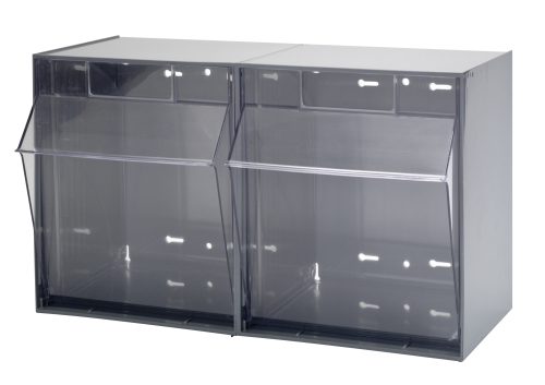 Quantum Tip Out Bins, featuring dual compartments and a handle with a label slot, have front lids that open to a 45° angle. Each plastic clear container is placed side by side within the polystyrene gray cabinet against a plain background. Made in the USA.