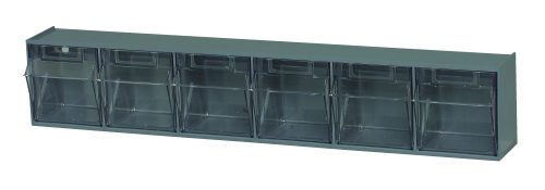 The Quantum Tip Out Bin features six clear plastic compartments that open to a 45° angle, each with a handle and label slot. The container is housed in a gray polystyrene cabinet. Made in the USA, it efficiently stores small items.