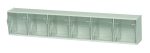 The Quantum Tip Out Bin offers a wall-mounted polystyrene white cabinet with six compartments. Each clear plastic compartment opens to a 45° angle, featuring handles and label slots for easy organization and visibility of essentials. Made in the USA.