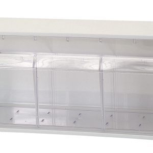The Quantum Dividable Tip Out Bin features two compartments and a clear plastic container with a white polystyrene cabinet. It measures 23-5/8W x 5-1/4D x 5-15/16H, opens to a 45° angle, and includes a handle with a label slot for efficiently organizing small items. Made in the USA.