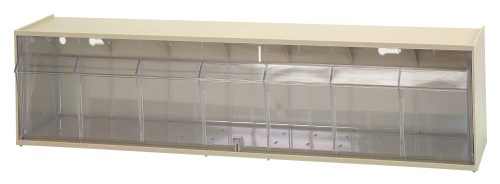 Introducing the Quantum Dividable Tip Out Bin, offering a single compartment in a 23-5/8W x 5-1/4D x 5-15/16H plastic clear container. Featuring an ivory polystyrene cabinet with a label slot and opening to a 45° angle, it enhances functional storage while saving space. Made in the USA.