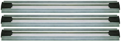 Against a white backdrop, three parallel aluminum tracks, each with black end caps, form the NSF-approved Quantum Double Unit Floor Track Assembly Kit. Made in the USA, it includes three 9-foot v-groove tracks apparently identical in size and design.