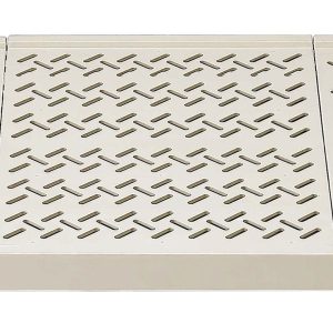 A beige, foldable kitchen cutting board with a perforated surface and visible hinges is designed for compact storage. Its an essential addition that pairs perfectly with the Quantum Shelf, featuring a 600 lb. capacity per shelf and a blue epoxy antimicrobial finish, suitable for various environments.