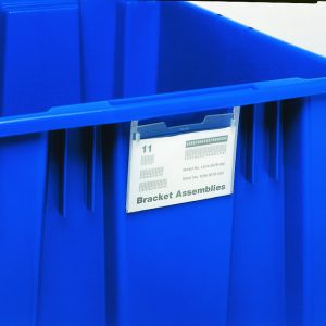 A Quantum Label Holder made of blue plastic, measuring 5W x 3D, includes a paper display labeled Bracket Assemblies with numerical details. Available in clear (6 per pack), it features grooved sides and an open top for easy access.