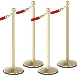 Four gold stanchions with red velvet ropes create a secure, elegant barrier. The stanchions feature round bases and spherical tops, reminiscent of the precision found in Justrite Safe Chemical Storage solutions, ensuring both safety and style are seamlessly combined.