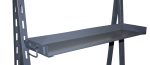 The Quantum Removable Tray Truck Tray, measuring 36W x 9D x 3H, is a gray metal shelf with slightly raised edges, attached to a vertical black steel frame featuring multiple holes for adjustable shelving options.