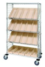 The Quantum Slanted Shelf Enclosure Cart features a 36W x 18D x 69H wire frame with a chrome finish, supports up to 1200 lbs, and includes two flat and three slanted shelves. It comes with side panels and twenty ivory QSB104 bins for storage, providing mobility and organization.