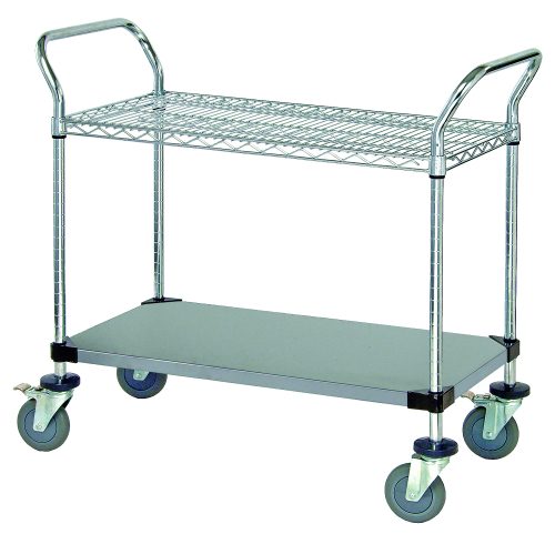 The Quantum Utility Cart, measuring 36W x 18D x 37-1/2H, boasts a 1200 lb. capacity with one wire shelf and one solid shelf. It features two U shaped handles for easy maneuvering and four 5 polyurethane swivel casters (two with brakes) on an open base, made from NSF-certified 304 stainless steel.