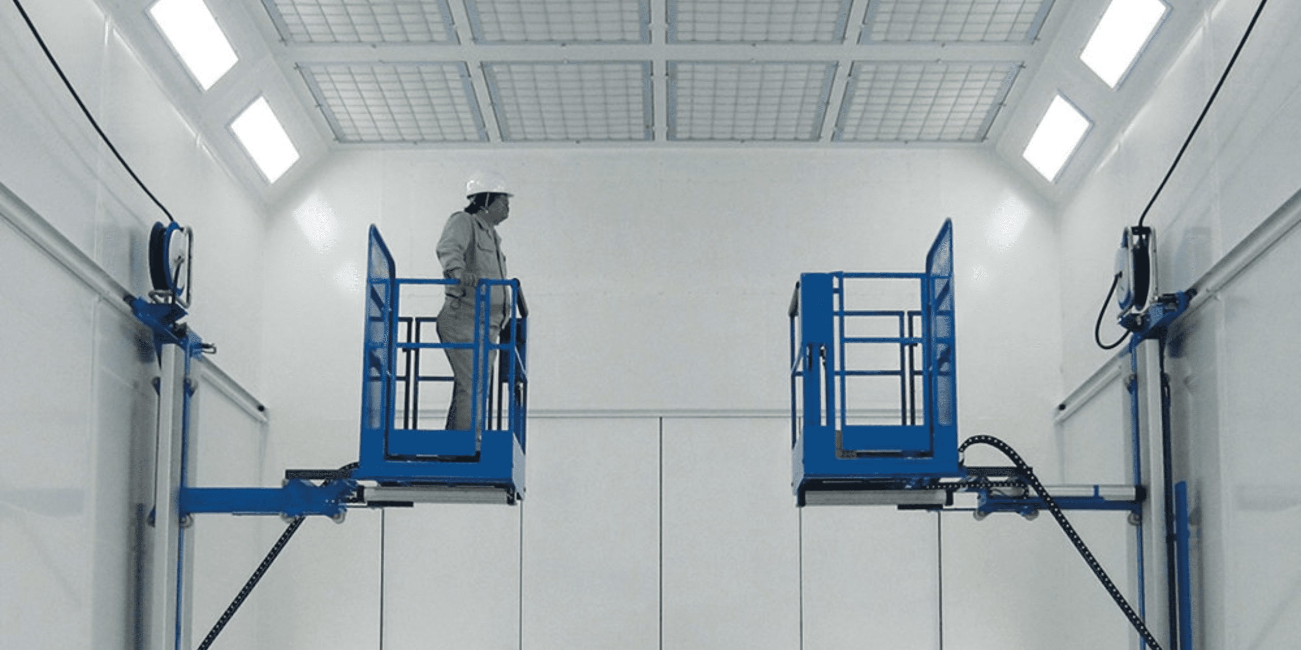Air powered lift table for paint room applications