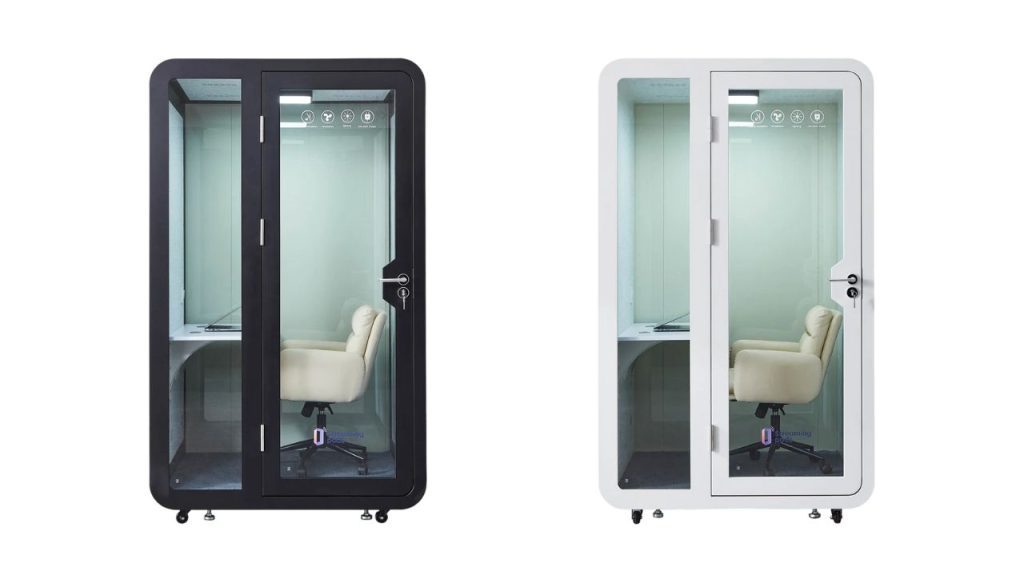 Two soundproof office phone booths are shown side by side; each contains a white office chair and a small desk. The left booth has a black frame, while the right booth has a white frame.