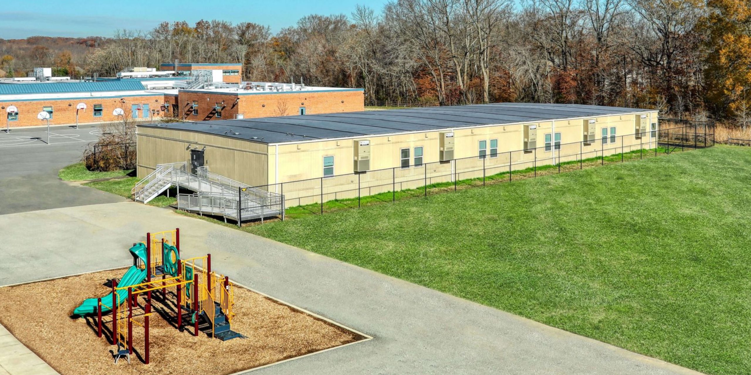 Completed modular equipment enclosure at an industrial site